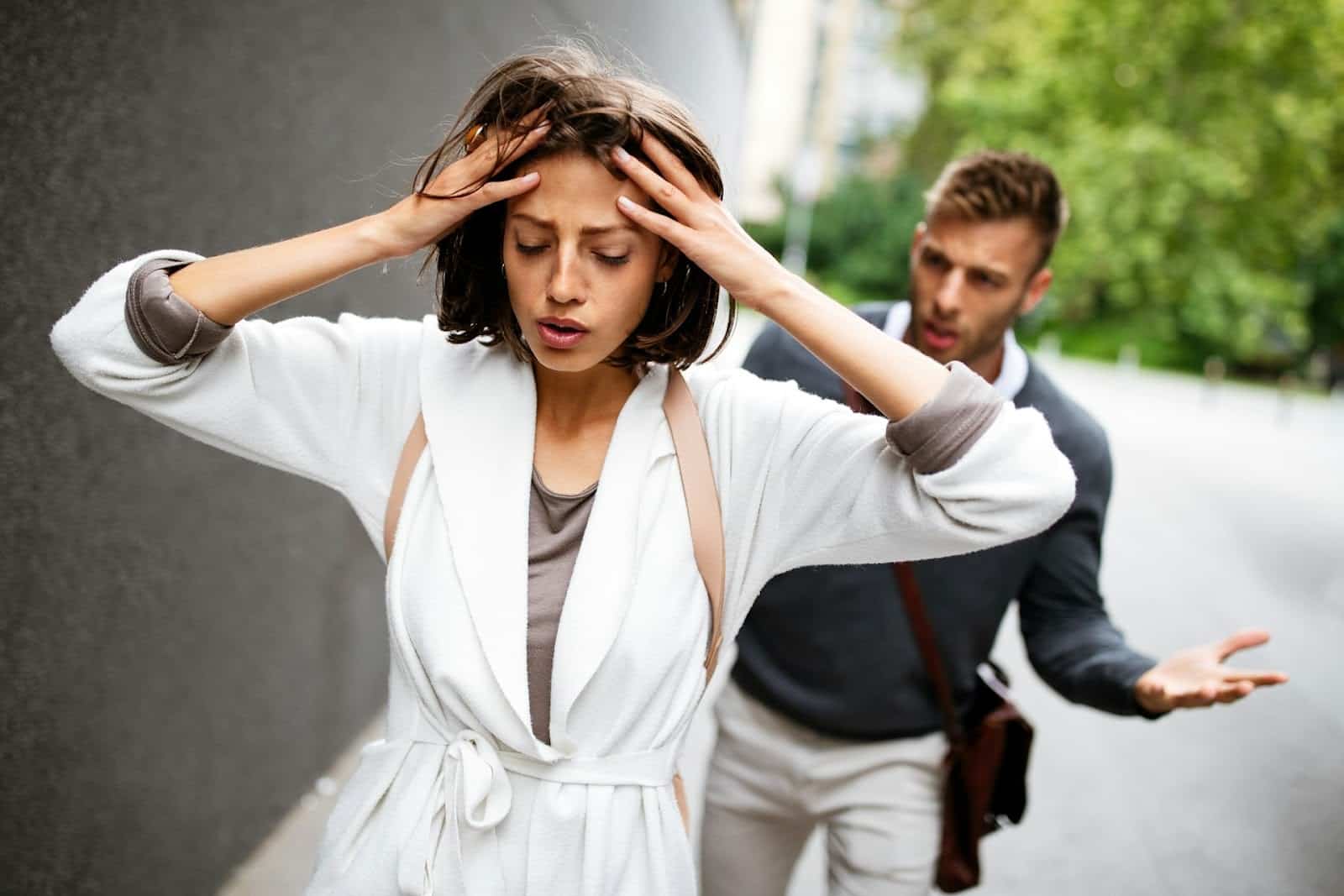A couple arguing in public