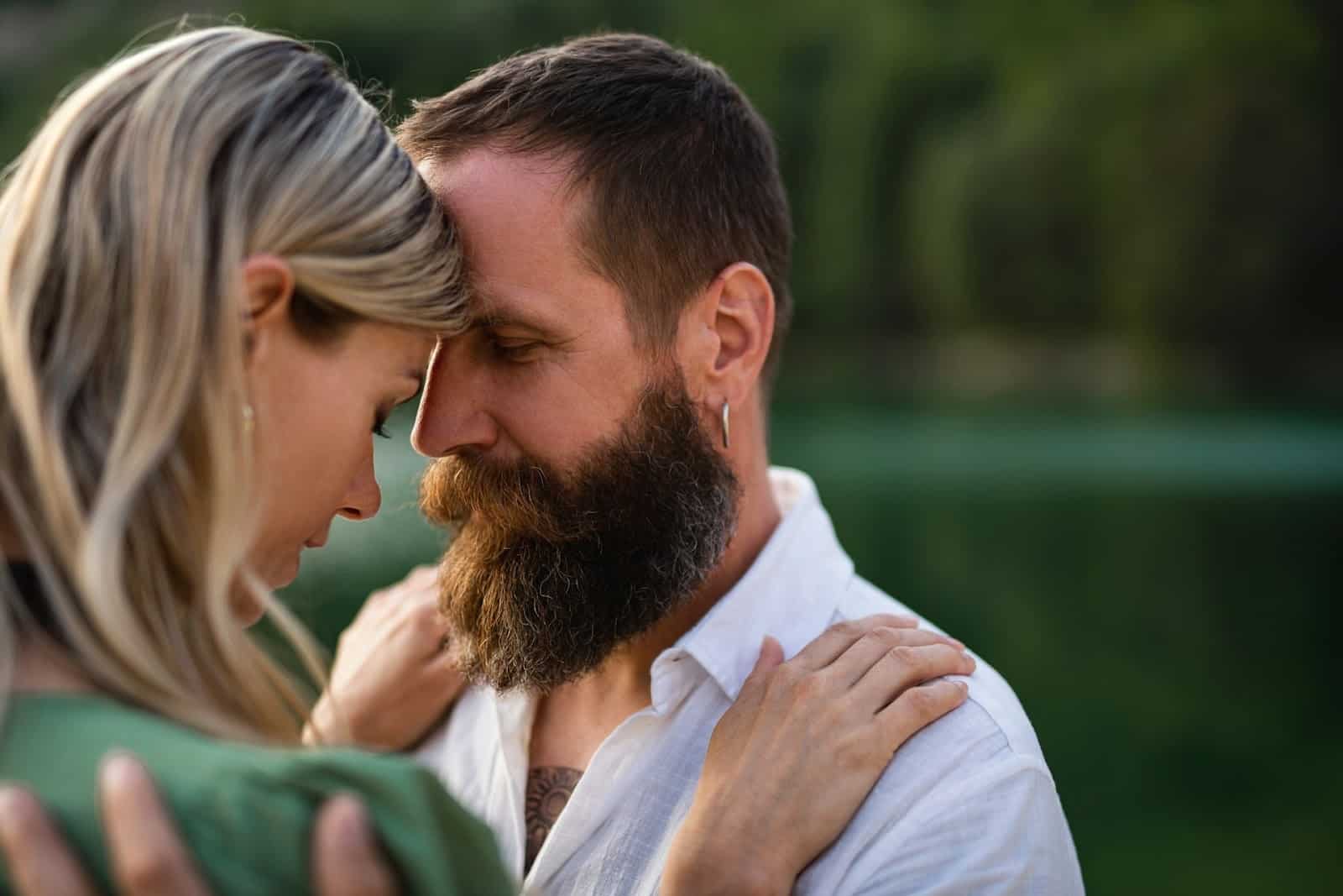 A couple facing each other