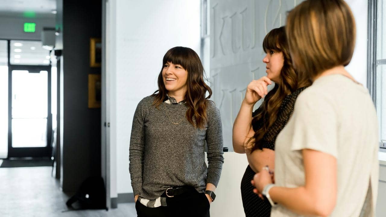 A group of women looking at something