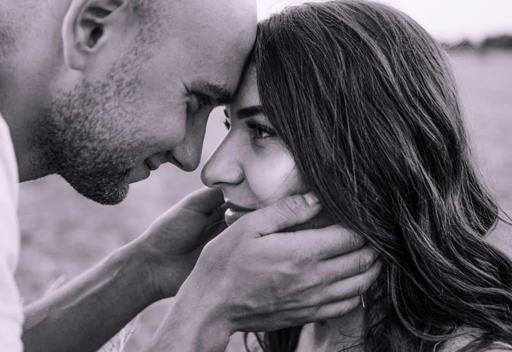 man comforting partner quietly