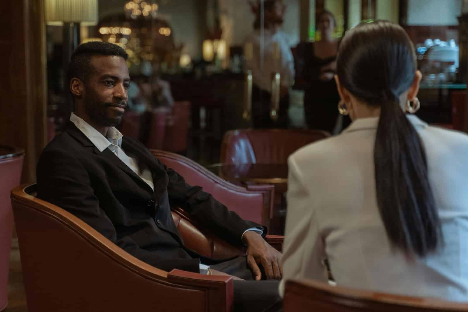 A man looking at the woman