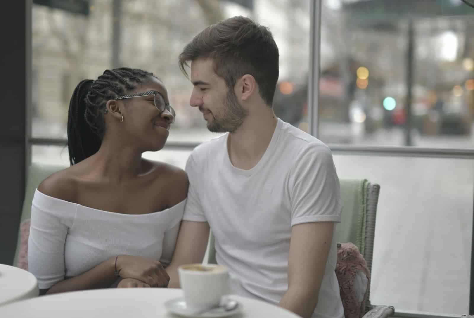 A man and woman looking at each other