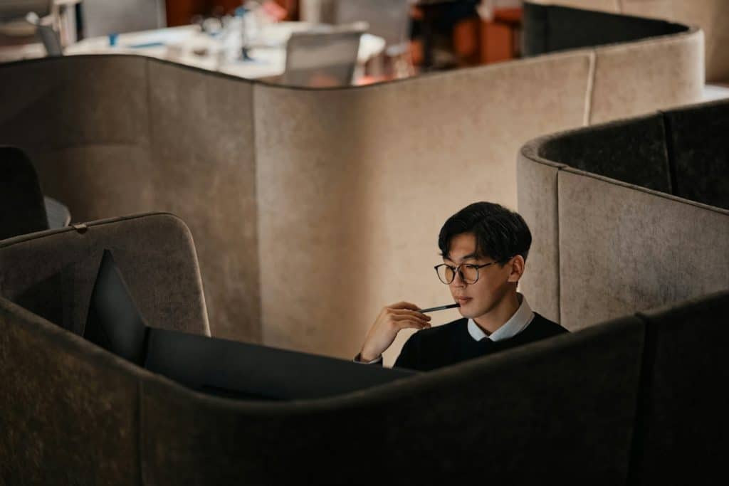 man working late office