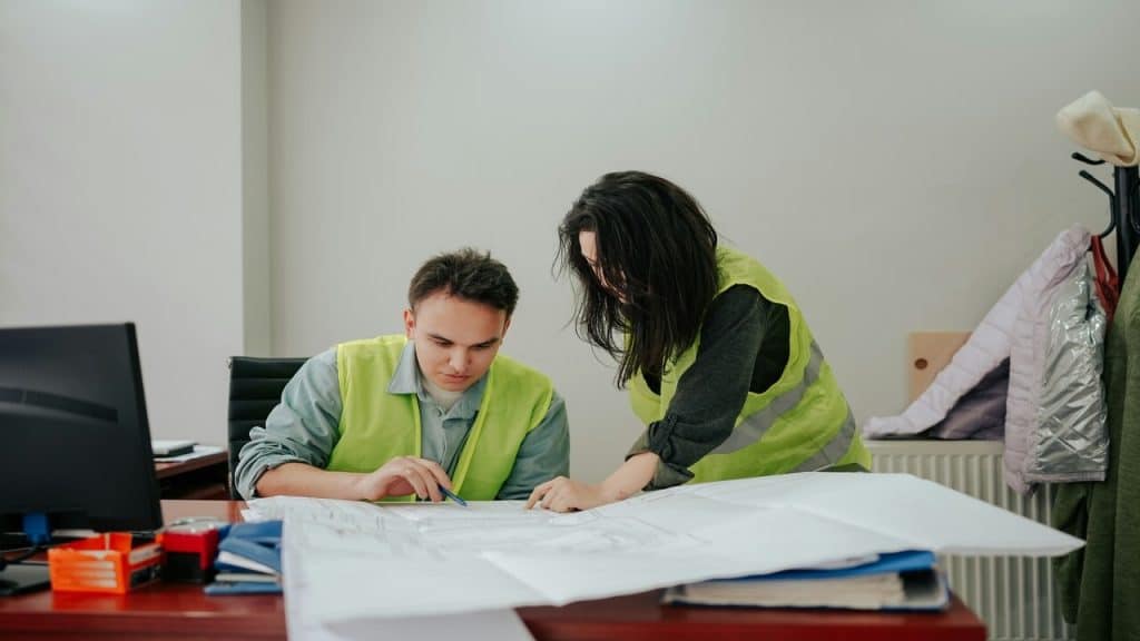A woman helping her colleague