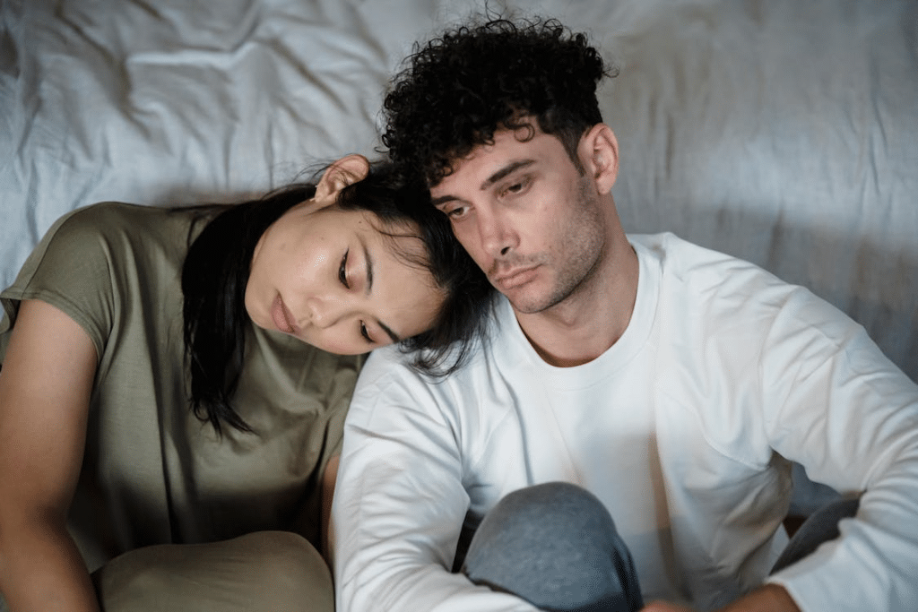 Unhappy Couple Sitting Together
