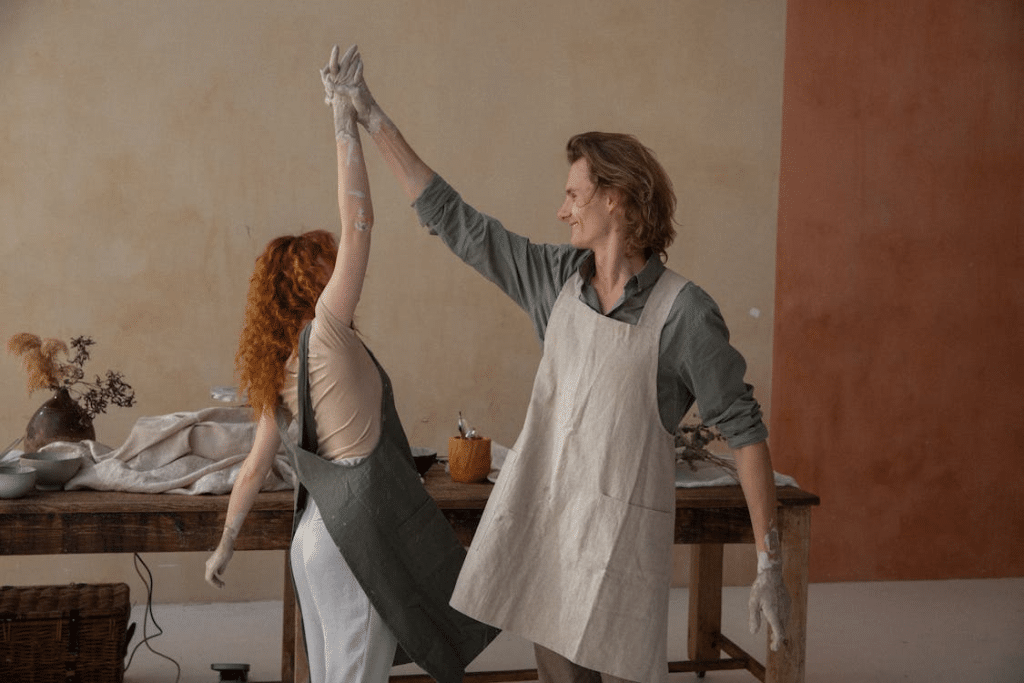A couple in a pottery class