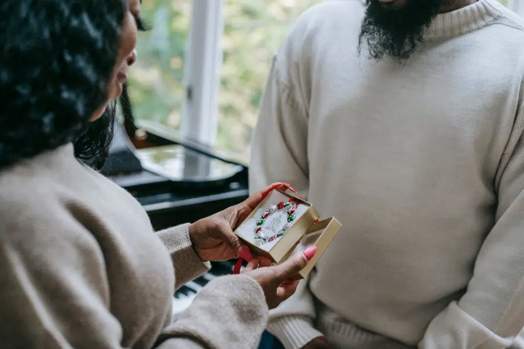 A man giving a present to a woman