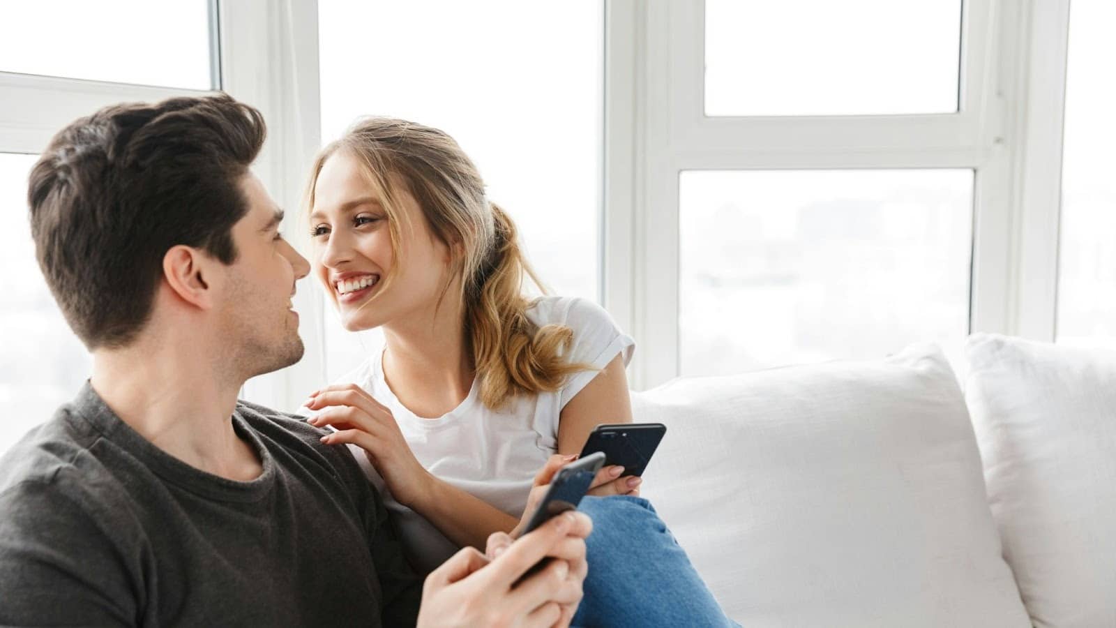 A man and woman looking at each other