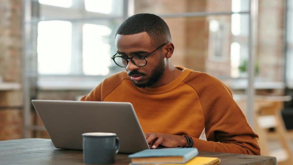 A man studying and reading