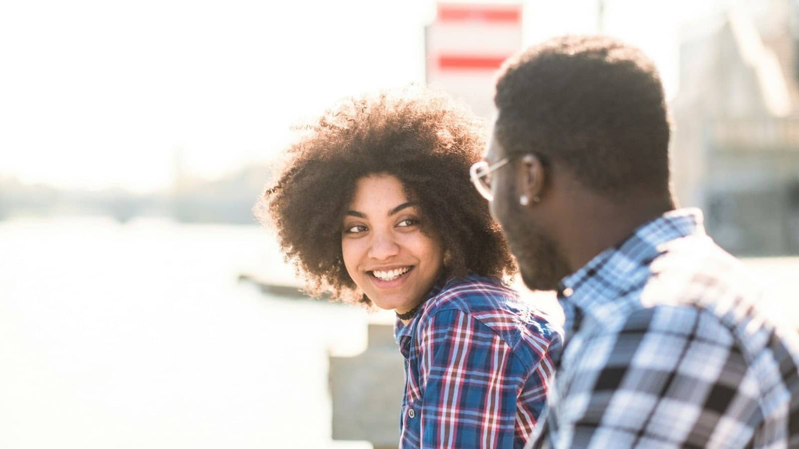 Woman smiling to a man