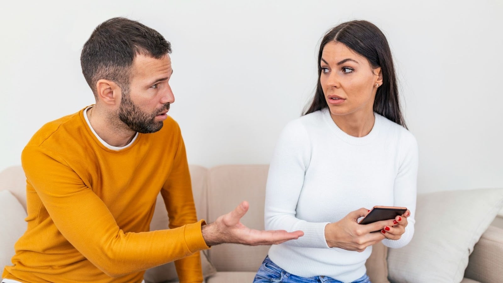 Woman interrogating a man