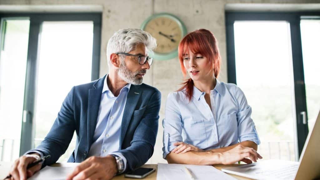 A man and woman talking 