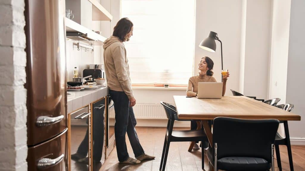 A man and woman talking