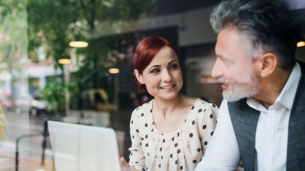 A man and a woman looking at each other