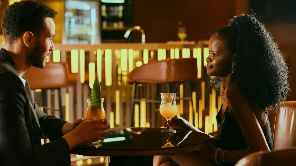 A man and woman at the bar