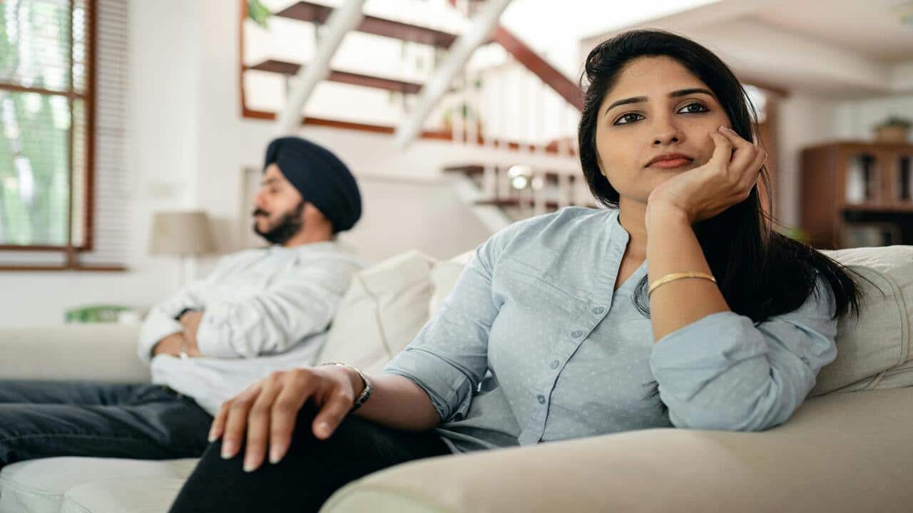 A couple ignoring each other