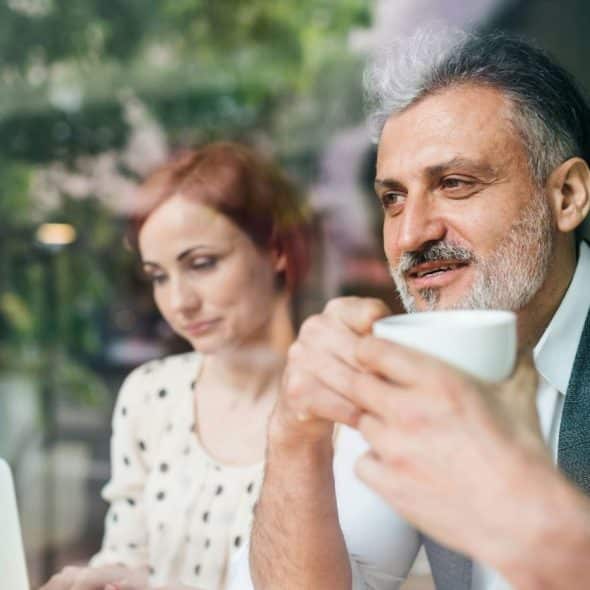 A man and woman at the cafe
