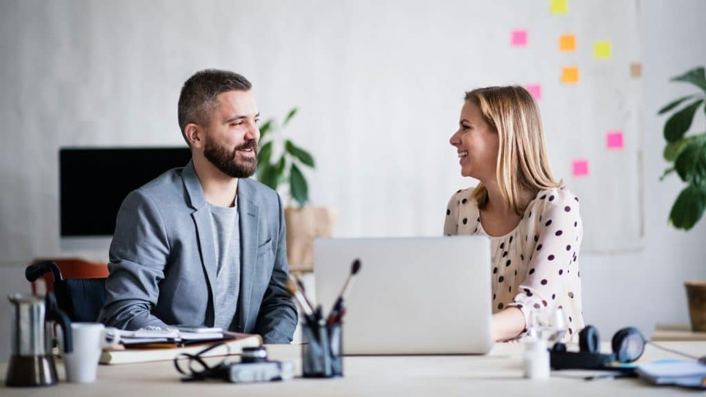 A man and woman talking