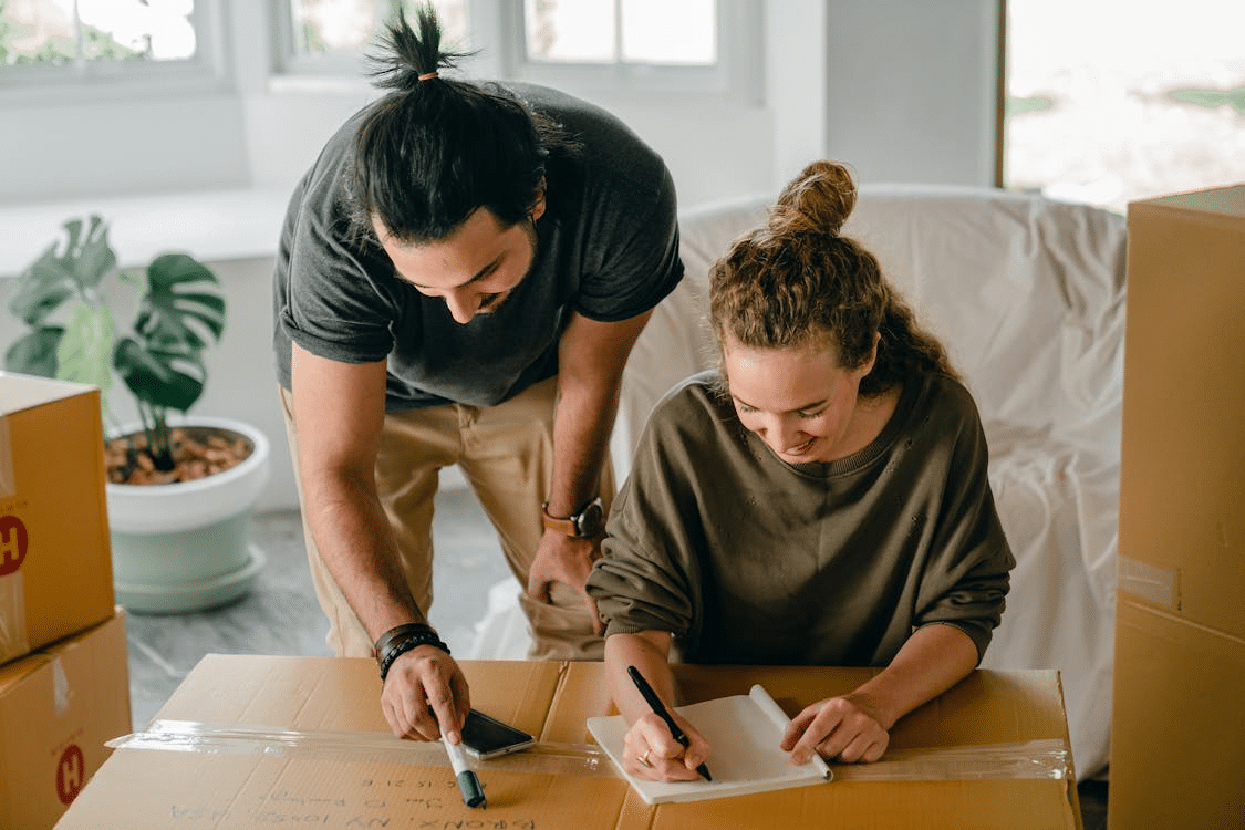 Married couple creating checklist together