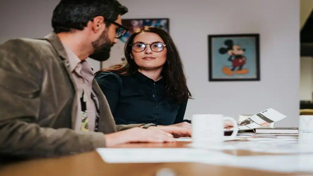 Colleagues talking at work