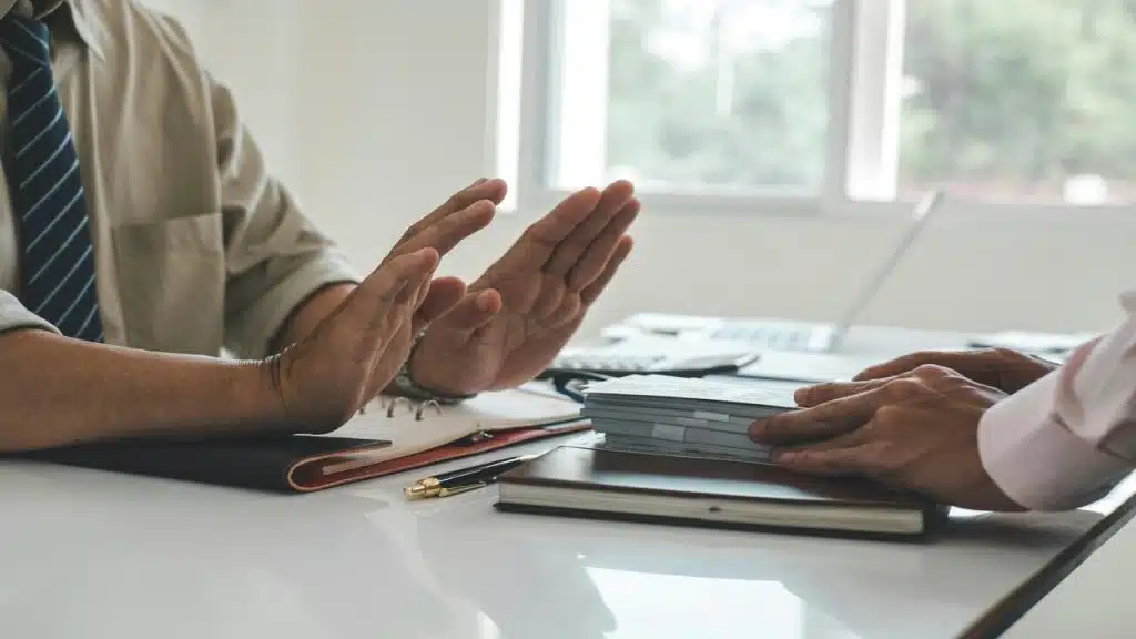 A man refusing a bribe