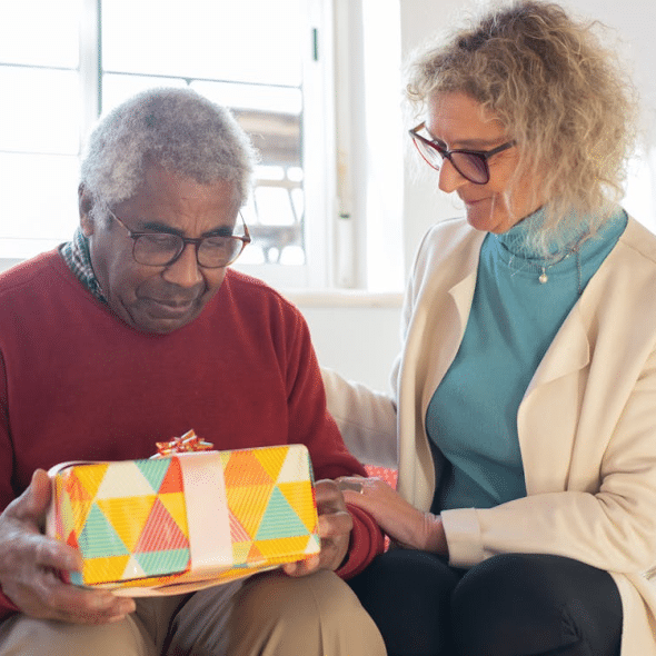 A man receiving a present