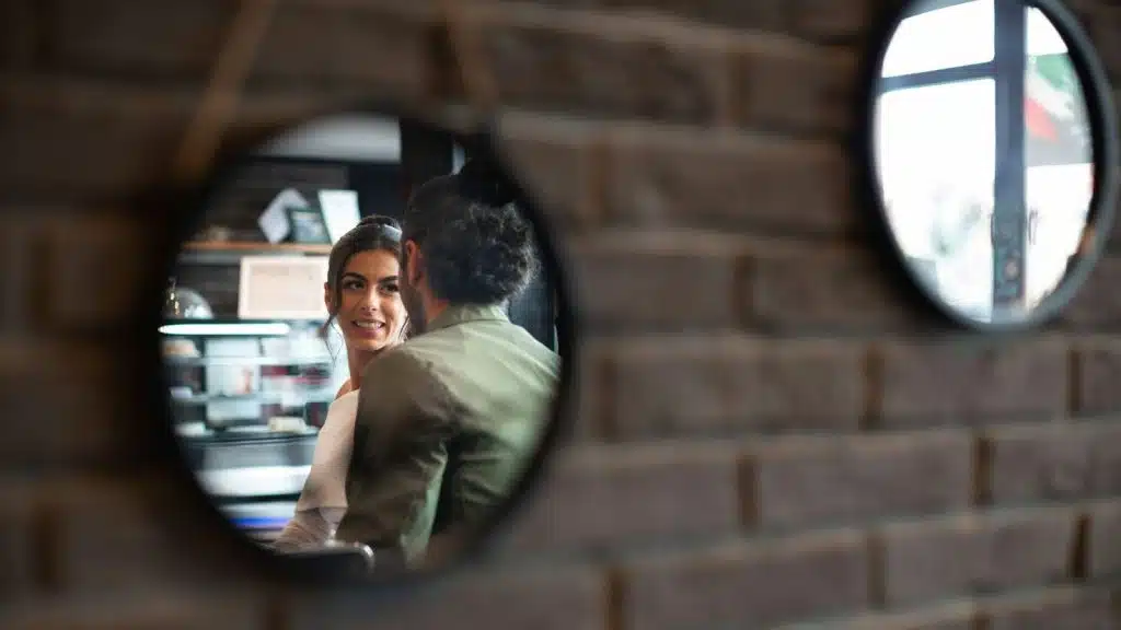 Woman looking at the man