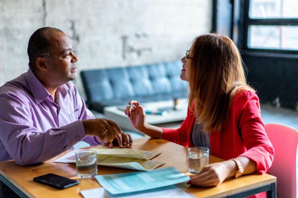 A man and woman talking
