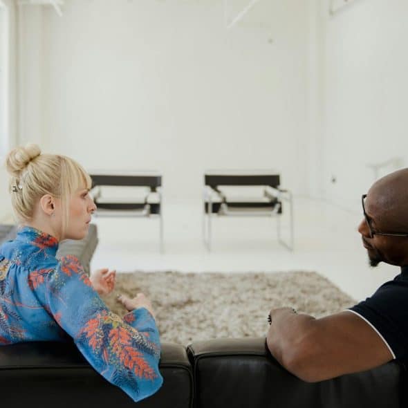 A man and woman talking