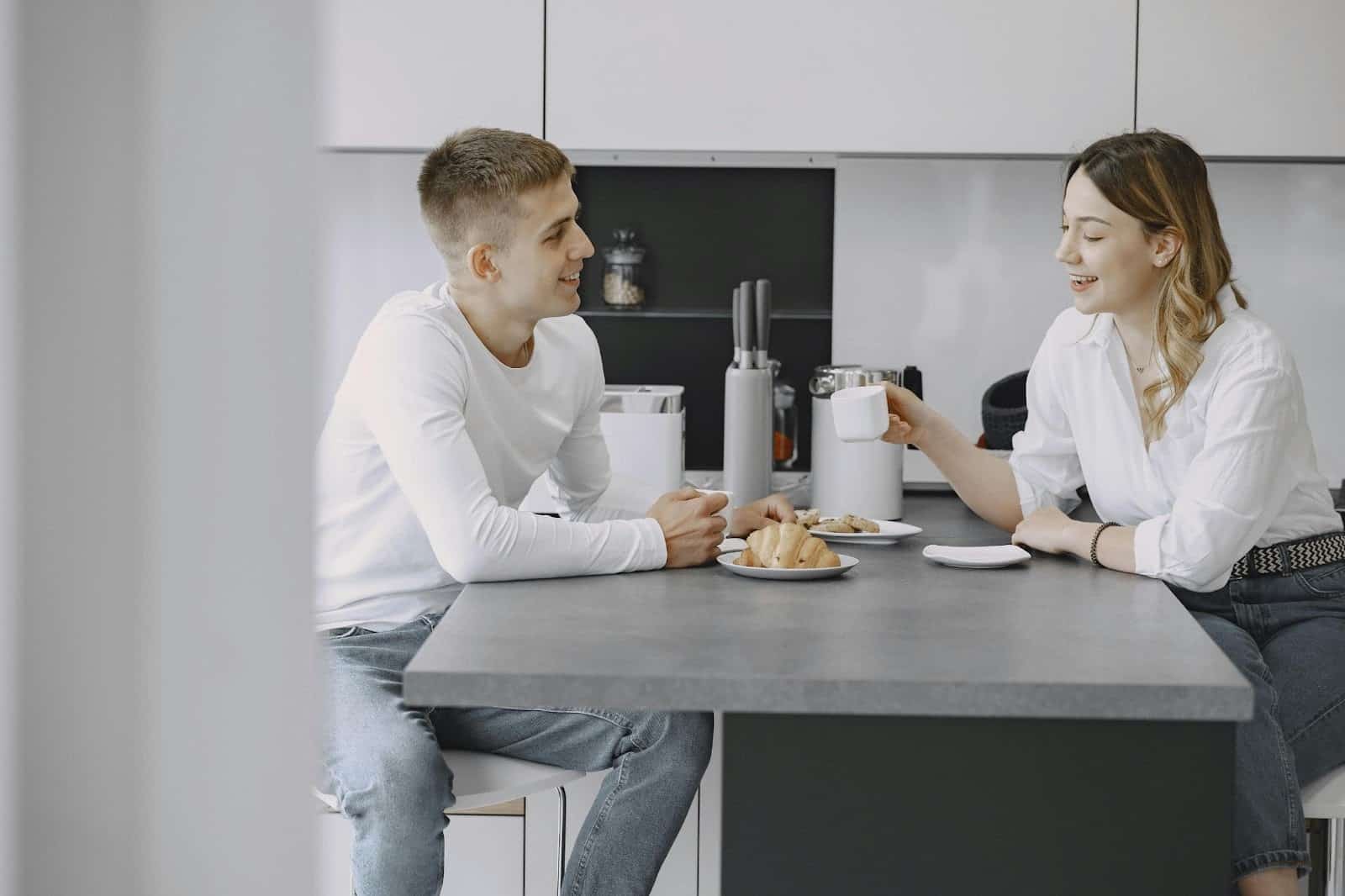 A man and woman talking