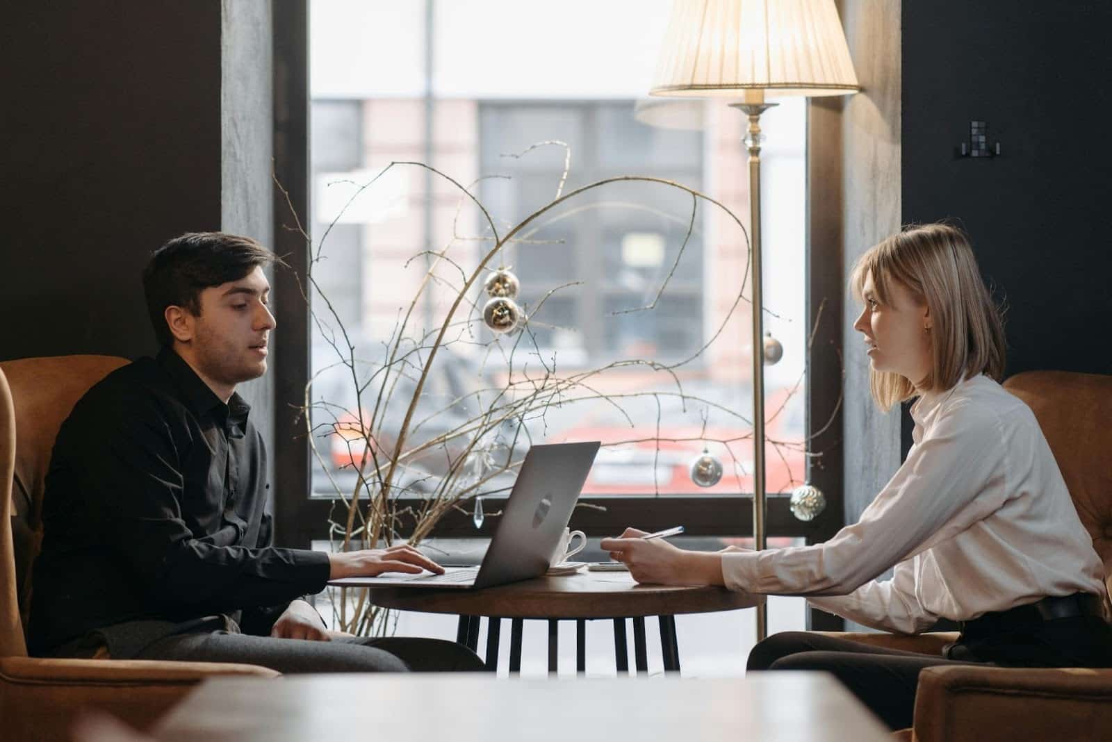 A man and woman talking