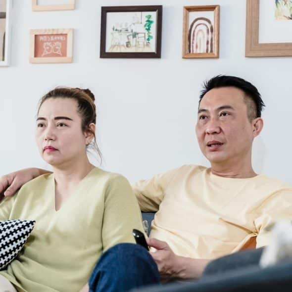 Couple sitting on the couch