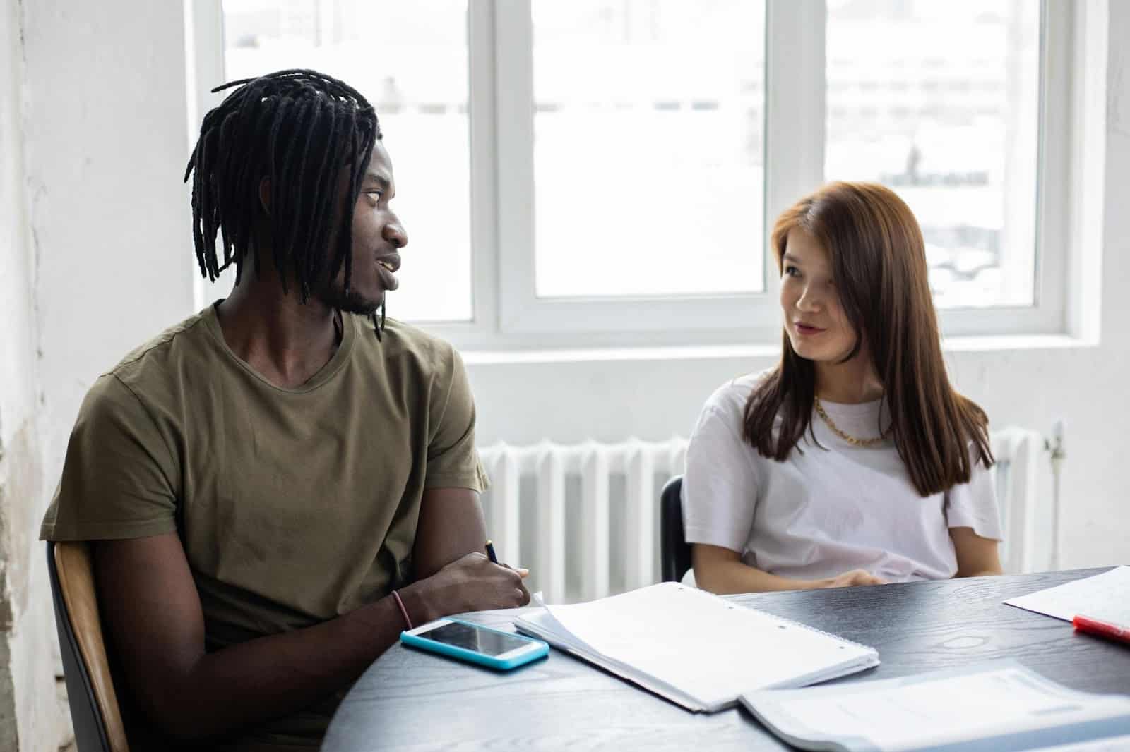 A man and woman talking
