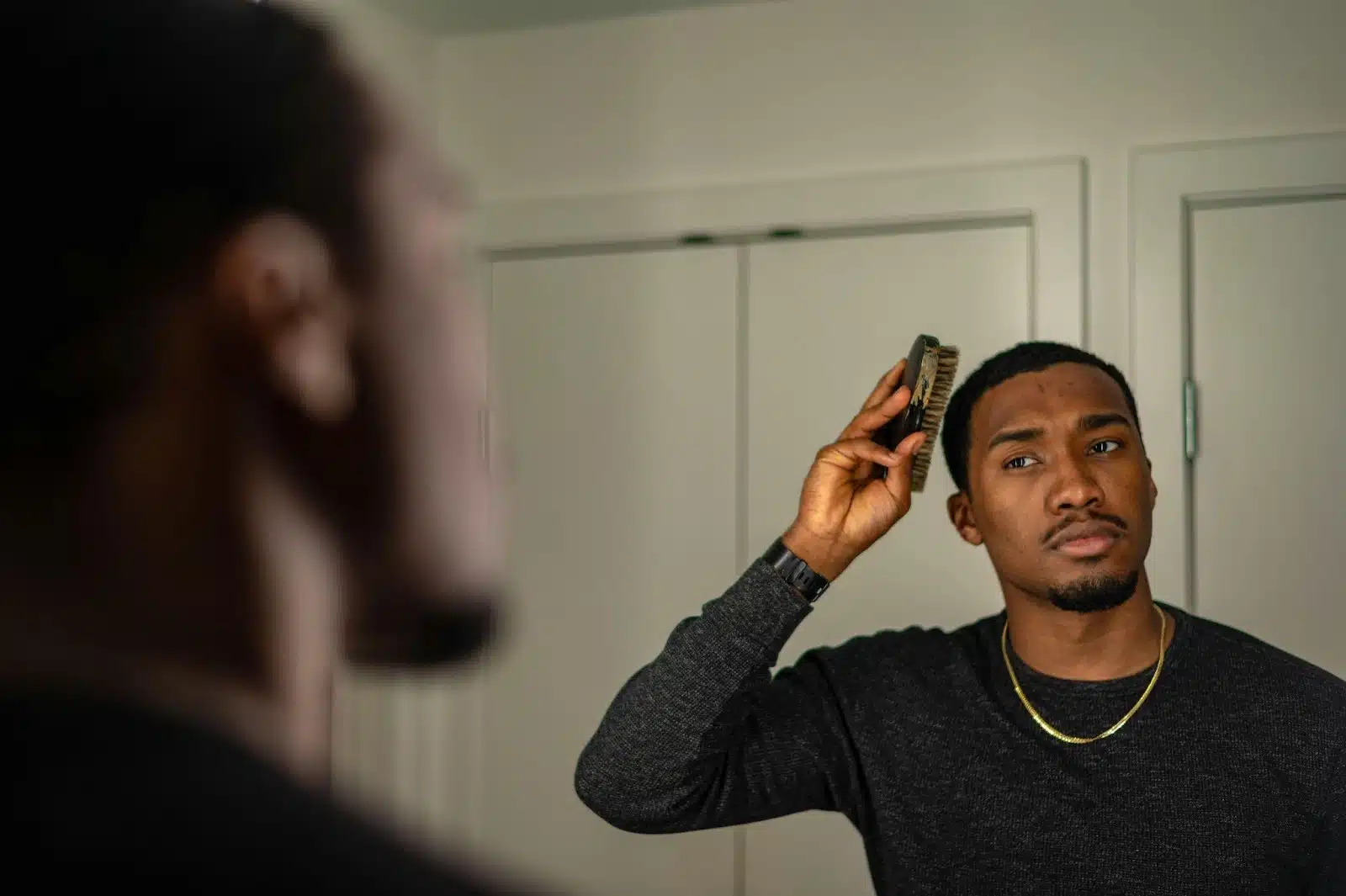 A man styling his hair