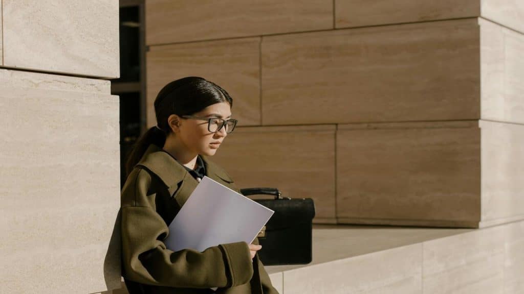 A woman looking sad while waiting