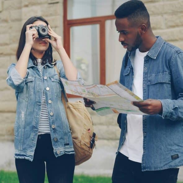 A couple looking at a man