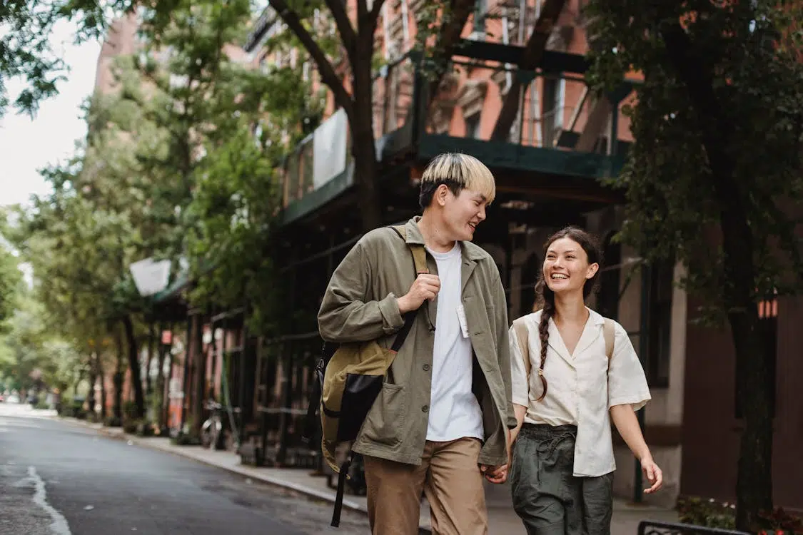 Couple walking together and happily talking