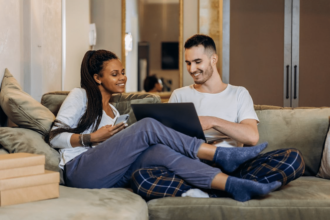 A couple on a couch talking