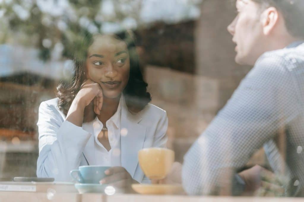 Woman listening to a man