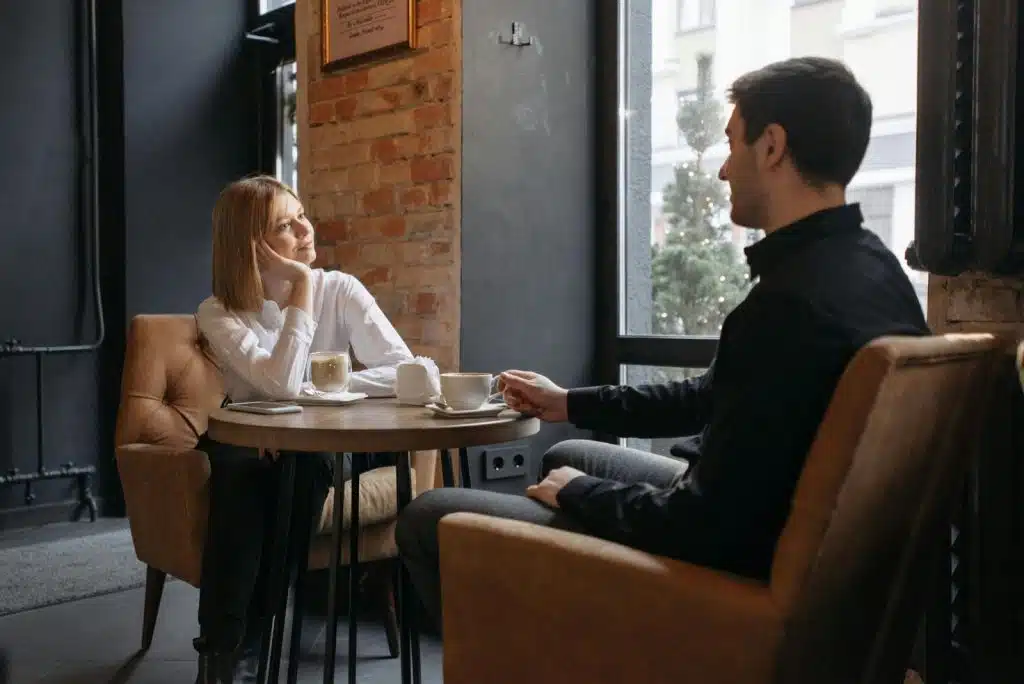 A man and woman talking