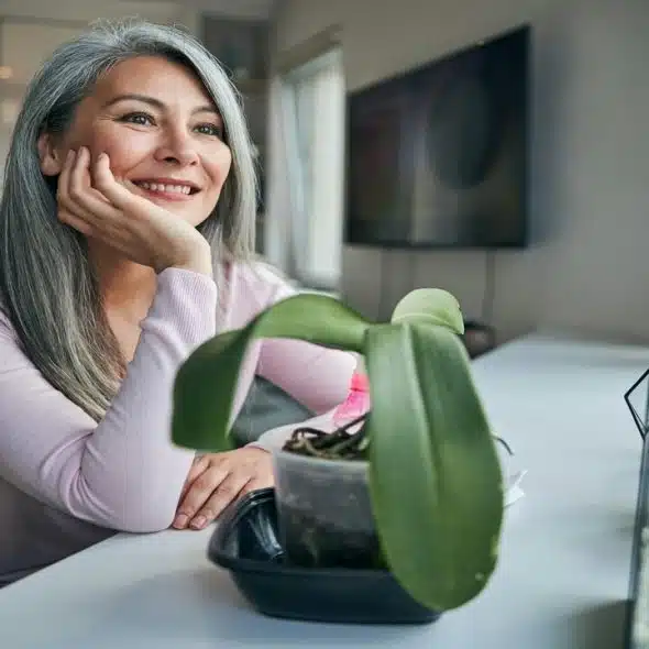 A beautiful mature woman smiling at home