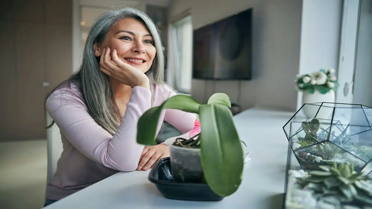 A beautiful mature woman smiling at home