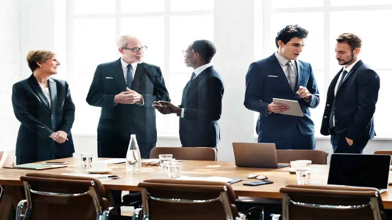 A group of senior executives talking