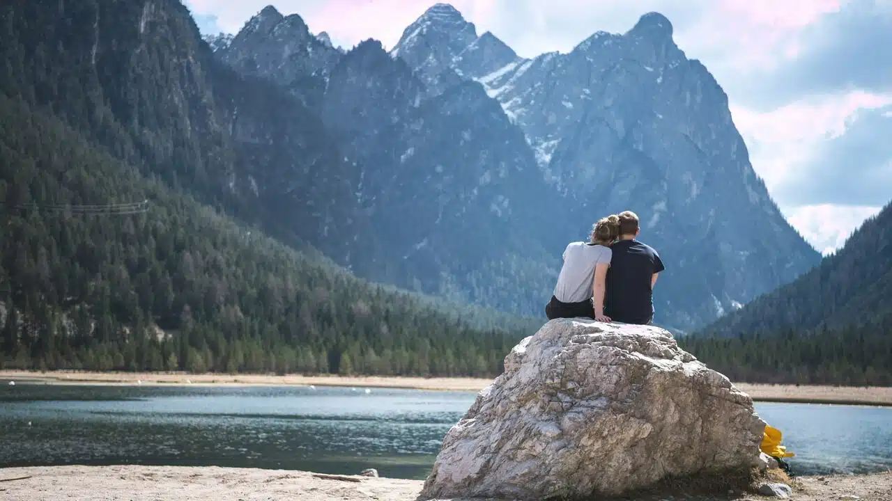 A couple resting while on a hike