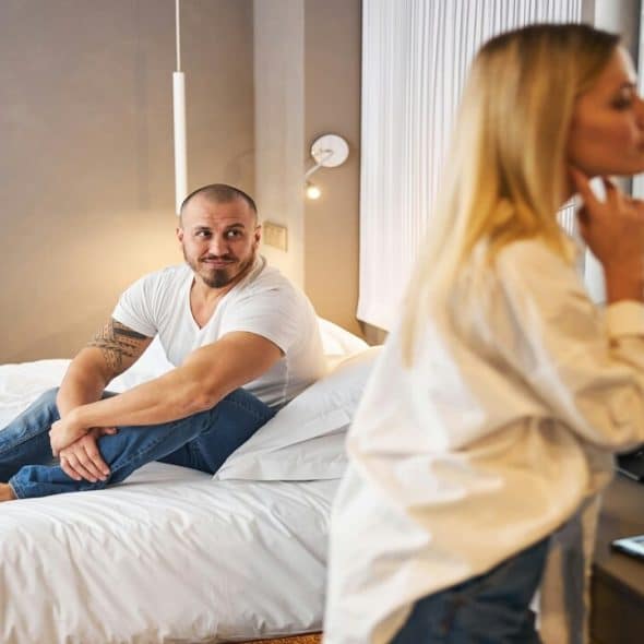 A man looking at his girlfriend