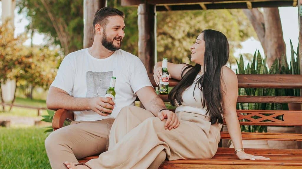 A couple sharing drinks