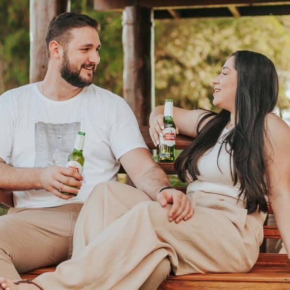 A couple sharing drinks