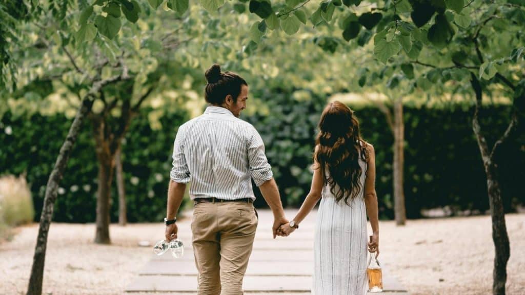 A couple holding hands