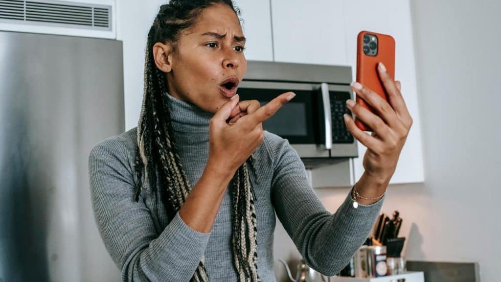 A woman reacting angrily