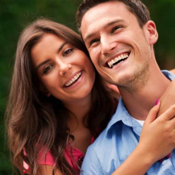 A happy couple smiling